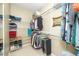 Walk in closet with ample shelving and functional storage solutions at 1114 Glenolden Ct, Cary, NC 27513