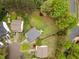 Aerial view showcases the property's layout within a residential neighborhood at 112 Mendells Dr, Holly Springs, NC 27540