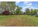 Large, level backyard provides plenty of room for outdoor activities and entertaining at 112 Mendells Dr, Holly Springs, NC 27540