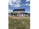 New two story home showing the rear exterior elevation and surrounding neighborhood at 112 Surles Landing Way, Benson, NC 27504