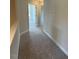Hallway with carpeted flooring and neutral-toned walls at 112 Surles Landing Way, Benson, NC 27504