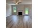 Comfortable living room with fireplace and hardwood floors at 112 Surles Landing Way, Benson, NC 27504