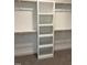 Walk-in closet with built-in shelving unit and ample hanging space at 112 Surles Landing Way, Benson, NC 27504