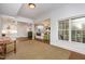 Large finished basement with an open floor plan, hardwood floors, and lots of natural light at 119 Faison Rd, Chapel Hill, NC 27517