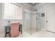 Bright bathroom with a glass walk-in shower and vanity area next to the window at 119 Faison Rd, Chapel Hill, NC 27517