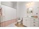 Clean bathroom with a shower/tub combo, vanity with storage, neutral walls and a light colored floor at 119 Faison Rd, Chapel Hill, NC 27517