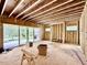 Spacious living room under construction, featuring large sliding glass doors and window framework at 1218 Kingwood Dr, Raleigh, NC 27609