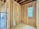 Room during construction showing the framework, window placement, and potential layout at 1218 Kingwood Dr, Raleigh, NC 27609
