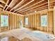 Sun room under construction highlighting window placement, natural light, and scenic views at 1218 Kingwood Dr, Raleigh, NC 27609
