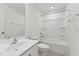 Clean bathroom featuring a vanity, toilet, and bathtub with shower at 1427 Goldsboro Ave, Sanford, NC 27330