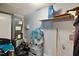 Unfinished storage area in the basement with an exposed furnace and shelving at 1431 Cherrycrest Dr, Durham, NC 27704
