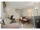 Cozy living room featuring comfortable seating and a staircase at 1431 Cherrycrest Dr, Durham, NC 27704