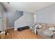 Cozy living room with wood floors and lots of natural light and ample space for seating at 1431 Cherrycrest Dr, Durham, NC 27704