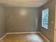 The room features neutral flooring and trim, complemented by gray walls at 1431 Cherrycrest Dr, Durham, NC 27704