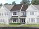 Attractive townhome showcasing stone accents and modern architectural details at 1431 Goldsboro Ave, Sanford, NC 27330