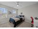 Well-lit bedroom featuring neutral walls, ceiling fan, and a comfortable queen bed at 1726 Wimberly Rd, Apex, NC 27523