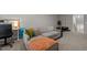 Comfortable living space with gray sofa, soft pillows, modern decor, and neutral carpeting at 1726 Wimberly Rd, Apex, NC 27523
