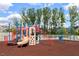 Colorful community playground with climbing structures, slides, and swings for children at 1726 Wimberly Rd, Apex, NC 27523