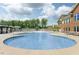 Large community pool with wading area and lounge chairs, ideal for summer relaxation at 1726 Wimberly Rd, Apex, NC 27523