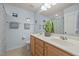 Bathroom featuring a double sink vanity, a plant, and neutral walls at 1728 Fern Hollow Trl, Wake Forest, NC 27587