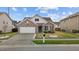 Lovely single-story home with an attached garage, neatly landscaped front yard, and a welcoming entrance at 1728 Fern Hollow Trl, Wake Forest, NC 27587