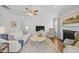 Cozy living room featuring hardwood floors, a fireplace, neutral paint, and a vaulted ceiling at 1728 Fern Hollow Trl, Wake Forest, NC 27587