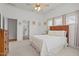 Spacious main bedroom with neutral decor, vaulted ceilings, and an ensuite bathroom at 1728 Fern Hollow Trl, Wake Forest, NC 27587