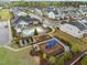 Aerial view showcasing the pool, playground, and community spaces within the neighborhood at 1915 Kings Knot Ct, Apex, NC 27502