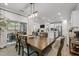 Open dining room, view of the kitchen and living area at 1915 Kings Knot Ct, Apex, NC 27502