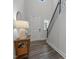 Bright entryway featuring wood floors and staircase at 1915 Kings Knot Ct, Apex, NC 27502