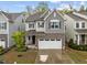 Charming two-story home featuring a stone facade and a two-car garage at 1915 Kings Knot Ct, Apex, NC 27502