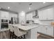 Modern kitchen featuring stainless steel appliances and a large island at 1915 Kings Knot Ct, Apex, NC 27502