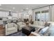 Bright, open concept living room and kitchen offering a seamless transition and ample space for entertaining at 1915 Kings Knot Ct, Apex, NC 27502