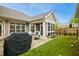 Well-maintained backyard with a patio area and outdoor grill, perfect for outdoor entertainment at 2112 Bradford Mill Ct, Apex, NC 27539