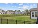 The fenced backyard has plenty of space to entertain in the grill and patio area at 2157 Blue Iris Way, Zebulon, NC 27597