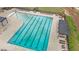 Enjoy a swimming pool, lounge chairs, and pergolas at the community pool at 2157 Blue Iris Way, Zebulon, NC 27597