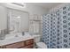 Bathroom featuring a vanity, and a shower with a stylish, patterned shower curtain for added privacy at 228 Dove Cottage Ln, Cary, NC 27519