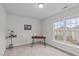 Bedroom featuring natural light, a wood desk and a charming world map at 228 Dove Cottage Ln, Cary, NC 27519
