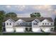 Charming two-story home featuring a gray facade, a one car garage, and nicely manicured landscaping at 2312 Sugar Cone Way, Fuquay Varina, NC 27526