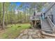Expansive backyard with lush greenery, a spacious deck, and wooded views at 250 Highview Dr, Youngsville, NC 27596