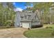 Well-maintained two-story home featuring a two-car garage and lovely landscaping and yard at 250 Highview Dr, Youngsville, NC 27596