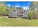 Attractive home with manicured lawn and tasteful landscaping featuring stone and siding accents at 250 Highview Dr, Youngsville, NC 27596
