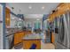 Spacious kitchen with stainless appliances, granite counters and breakfast nook bathed in natural light at 250 Highview Dr, Youngsville, NC 27596