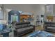 Spacious living room showcasing hardwood floors, open layout, and seamless connection to the kitchen at 250 Highview Dr, Youngsville, NC 27596