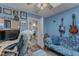 Comfortable home office with lots of natural light, and wood flooring at 250 Highview Dr, Youngsville, NC 27596