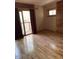 Bright bedroom with wood floors, large windows, and a modern aesthetic at 2811 Chicken Bridge Rd, Pittsboro, NC 27312