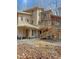 Expansive rear view of a multi-level home with a screened-in porch and wooden decks at 2811 Chicken Bridge Rd, Pittsboro, NC 27312