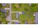 Aerial view of the property highlighting the lot, yard, roof, and street access at 311 Culvert St, Apex, NC 27502
