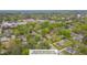 Aerial view of the property showing the lot lines, surrounding greenery, and neighborhood at 311 Culvert St, Apex, NC 27502
