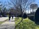 Scenic view of a walking path near the community with landscaping and pedestrian access at 311 Culvert St, Apex, NC 27502
